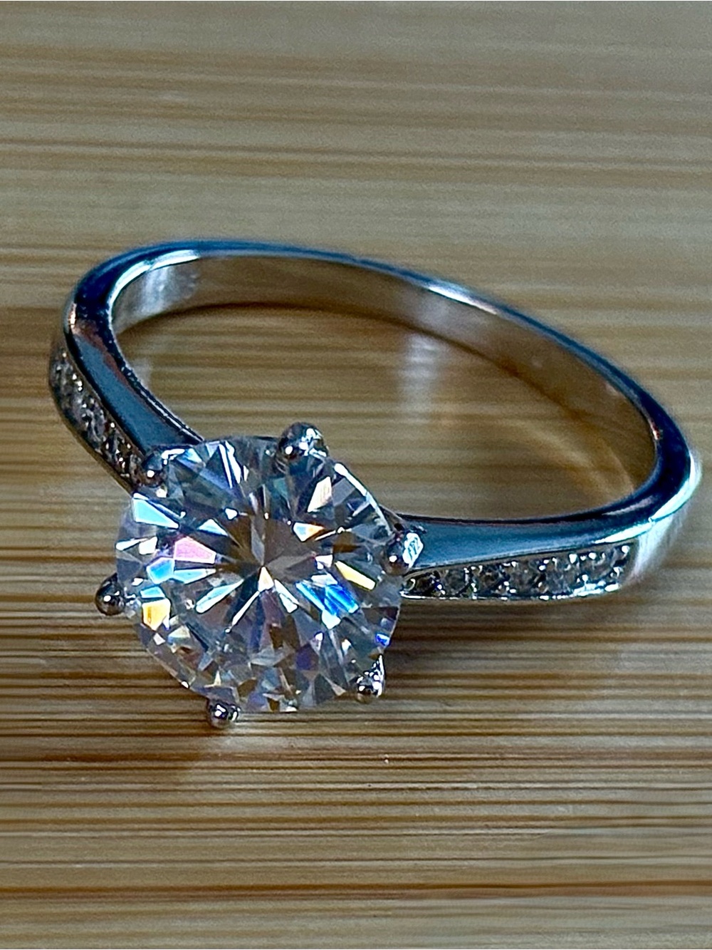 A delicious 3ct certified Moissanite solitaire ring with tapered shoulders!